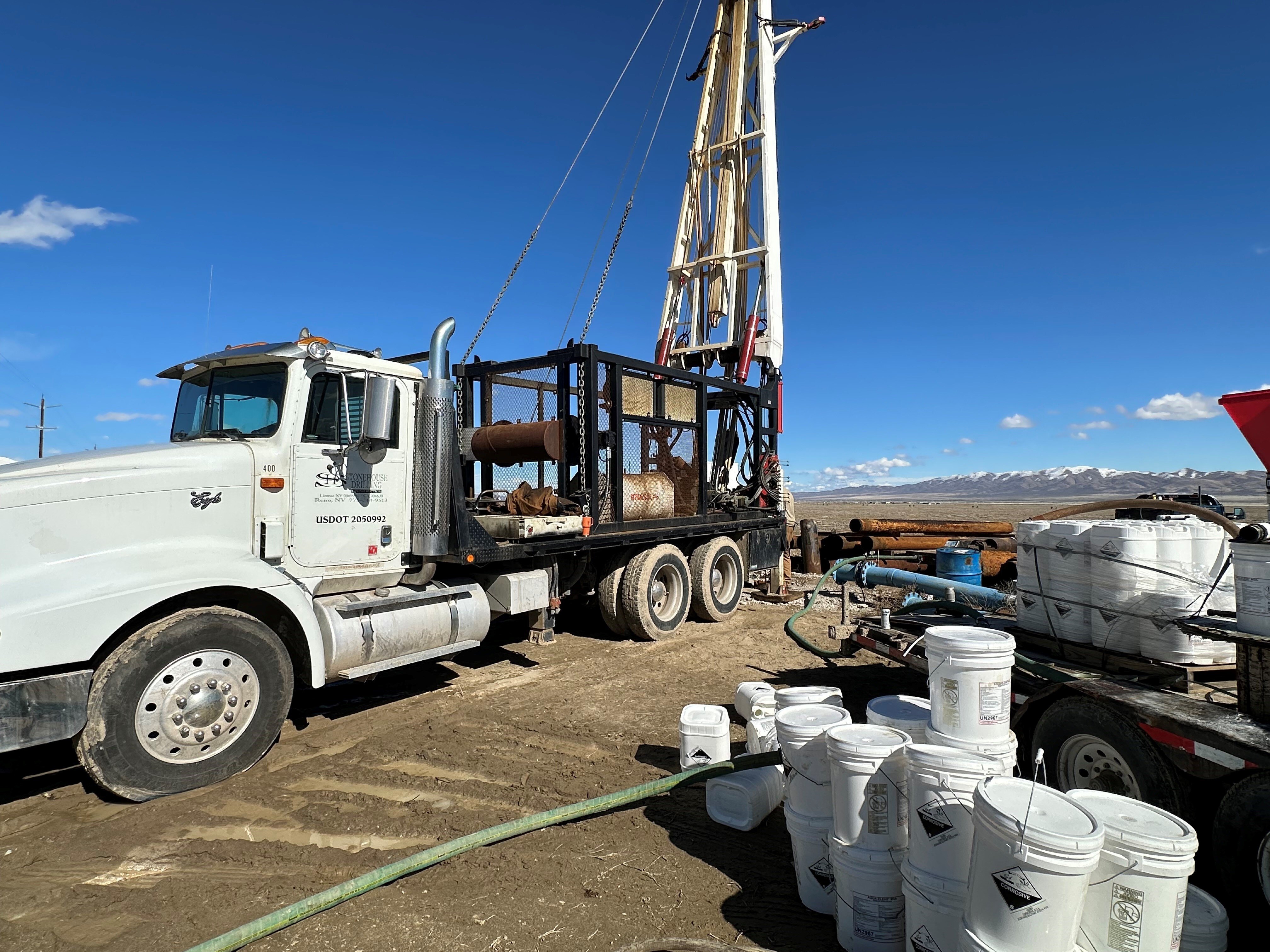A drilling truck setting up for a well drilling job